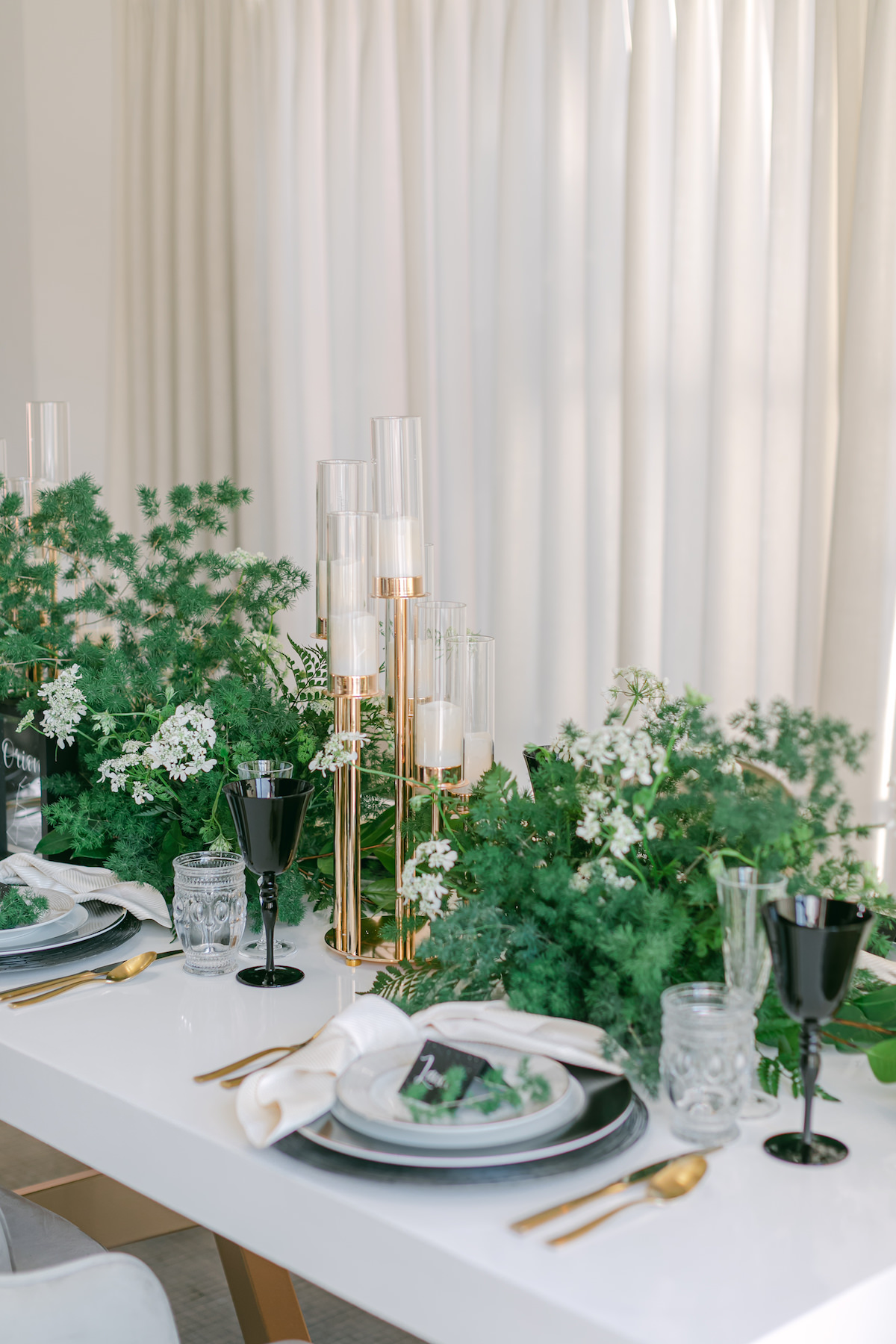 Minimalist contemporary table with greenery centerpieces - Lily Tapia Photography