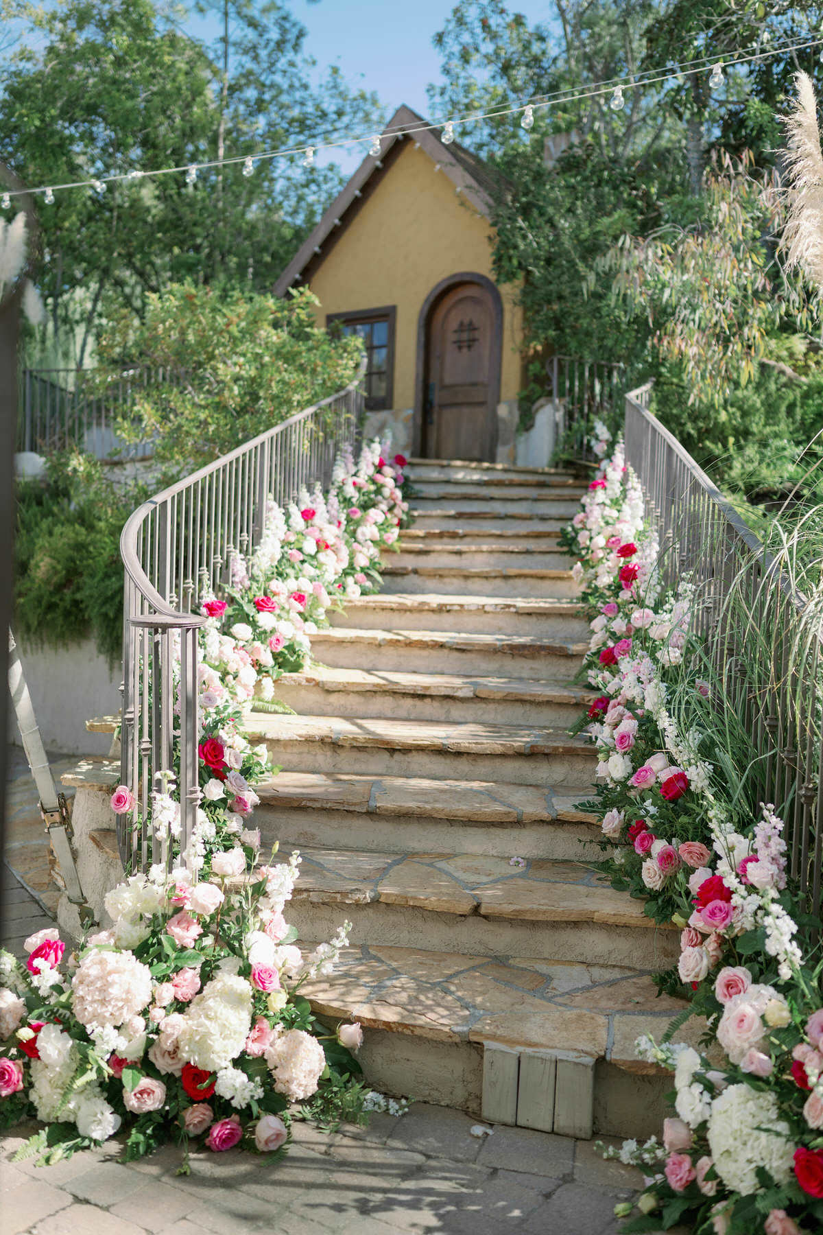 Pink Wedding staircase flower installation - Peony Park Photography
