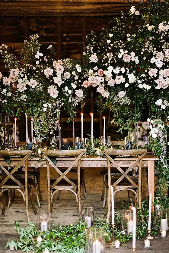 Stunning flower arch reception table decor with candles Barn Wedding -Twah Photography