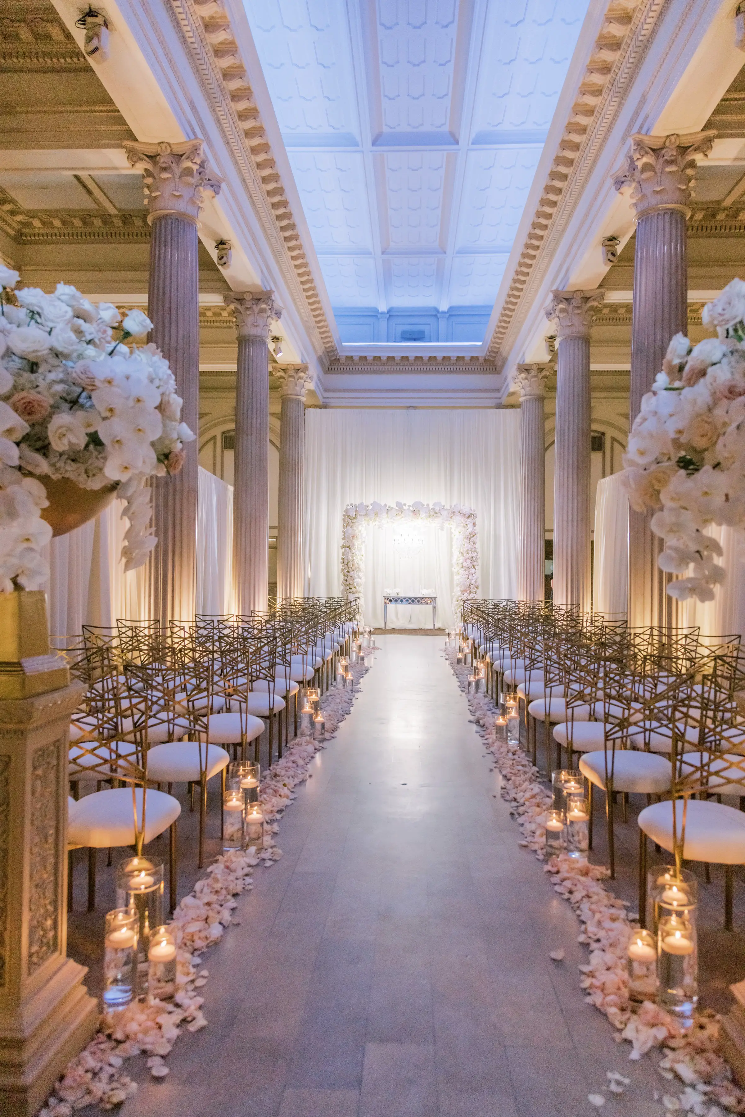 Indoor glamorous wedding ceremony decor - Photography: Brooke Images