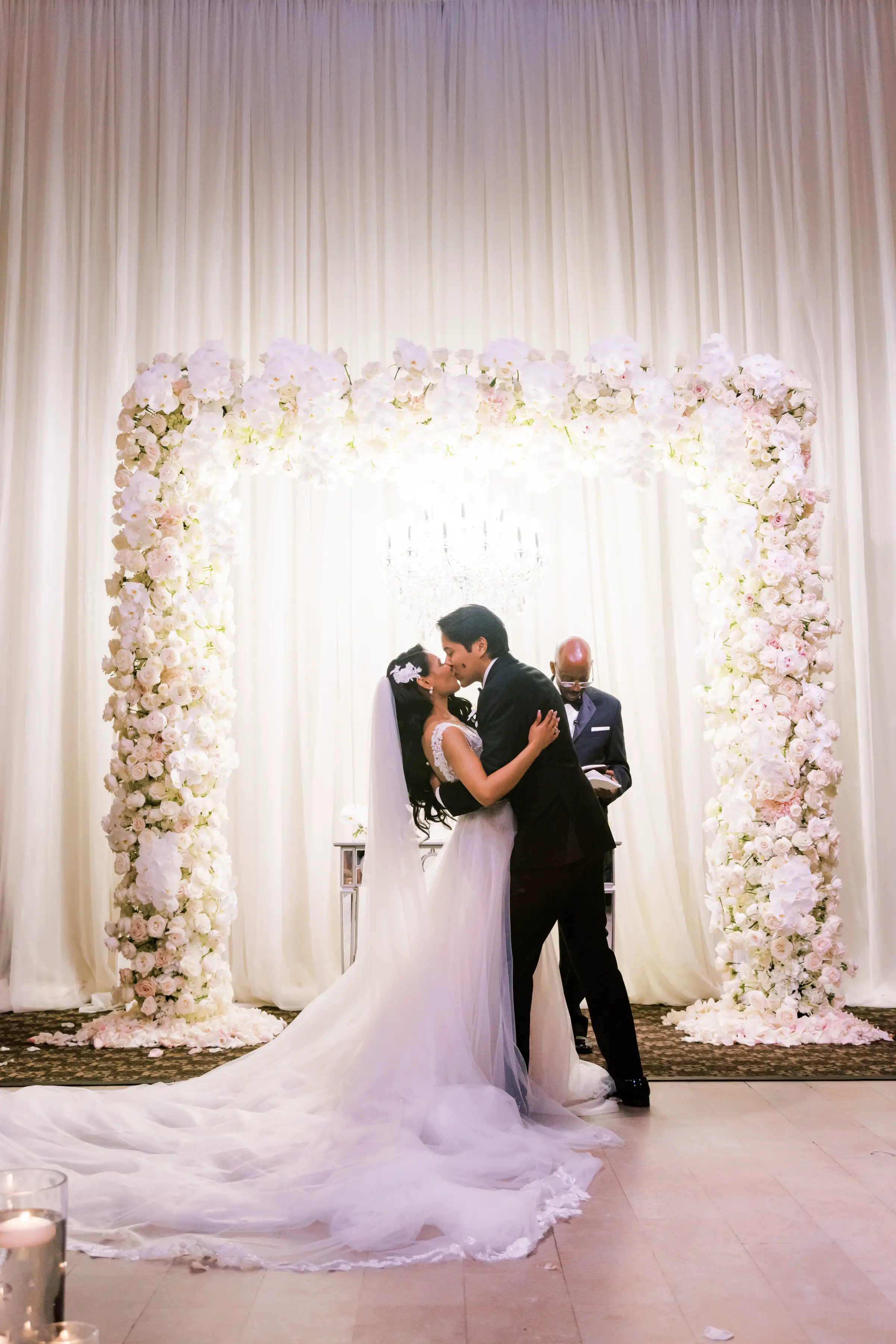 Luxury Ballroom Wedding Ceremony with floral arch - Photography: Brooke Images