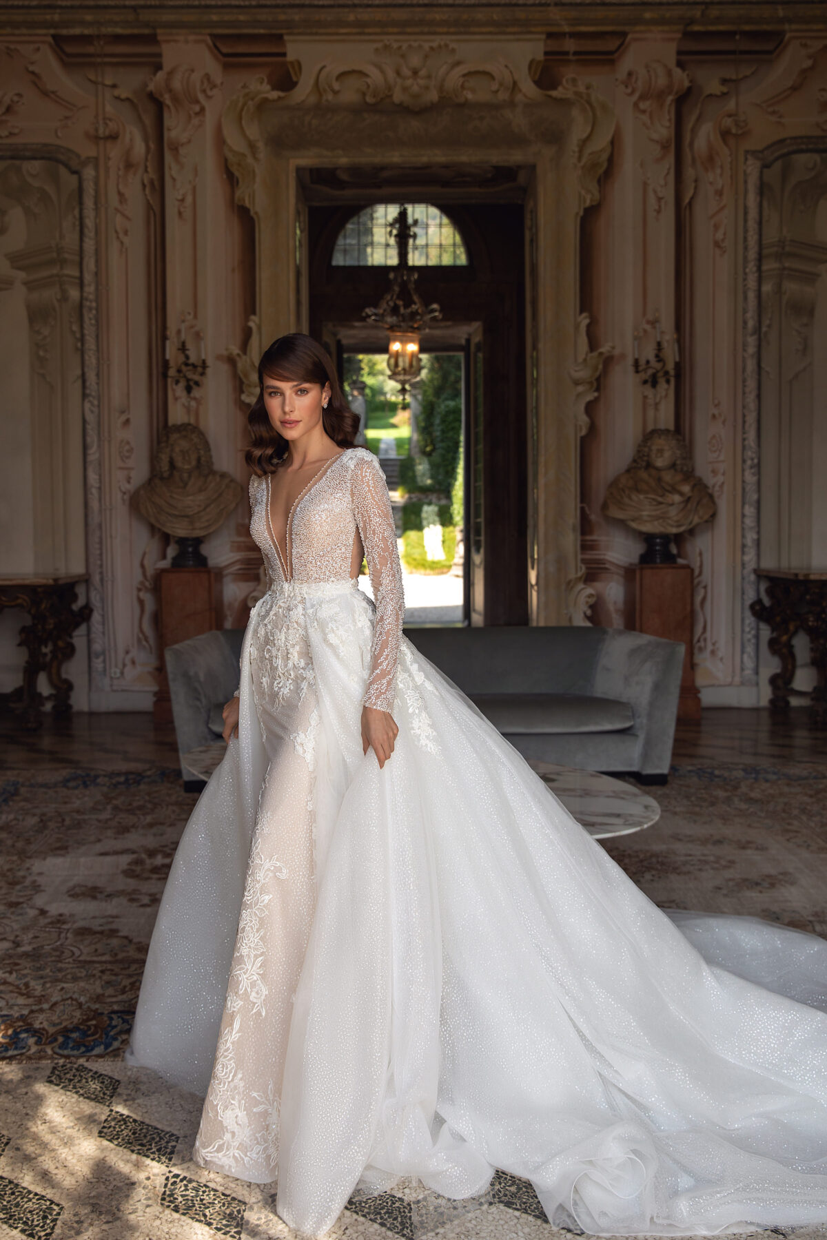 Elegant mermaid wedding dress with over skirt and long sleeves - Pollardi 2023 - Domenica