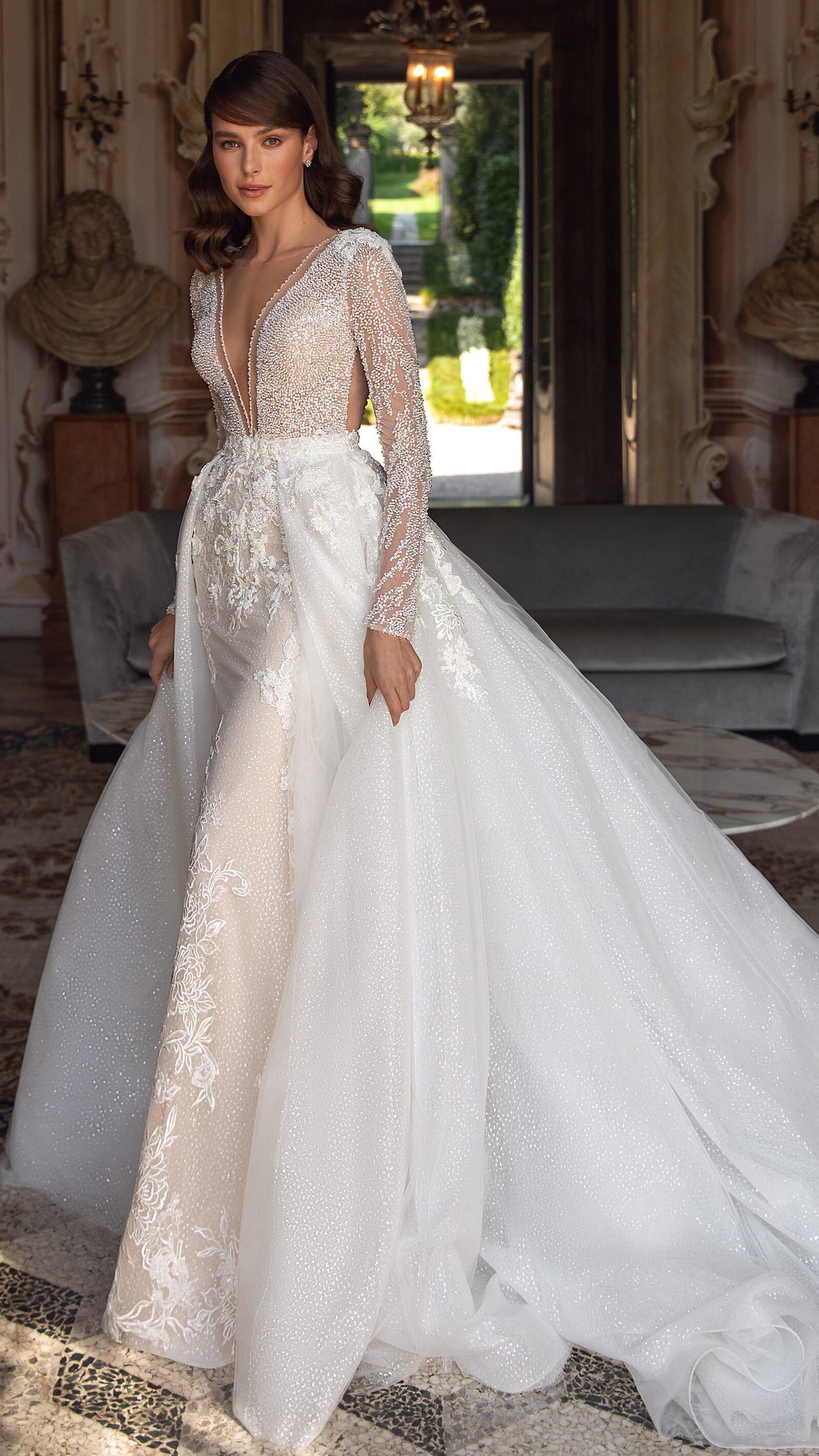 Elegant mermaid wedding dress with over skirt and long sleeves - Pollardi 2023 - Domenica